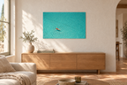 Overhead print hanging in a sunlit Mediterranean living room