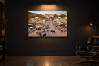 India No. 09 — Market Gate — photo print shown in a dark gallery room under a picture light