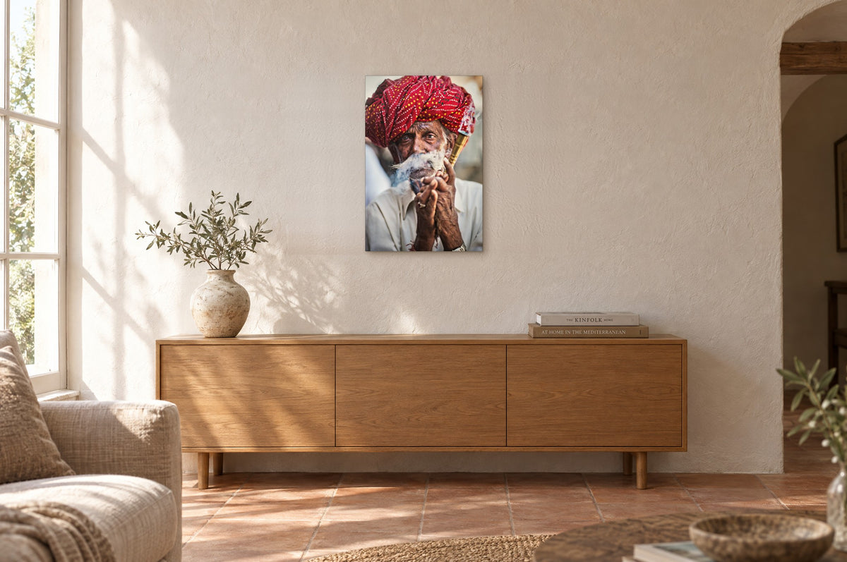 India No. 07 — Red Turban — photo print shown on a wall in a Mediterranean living room