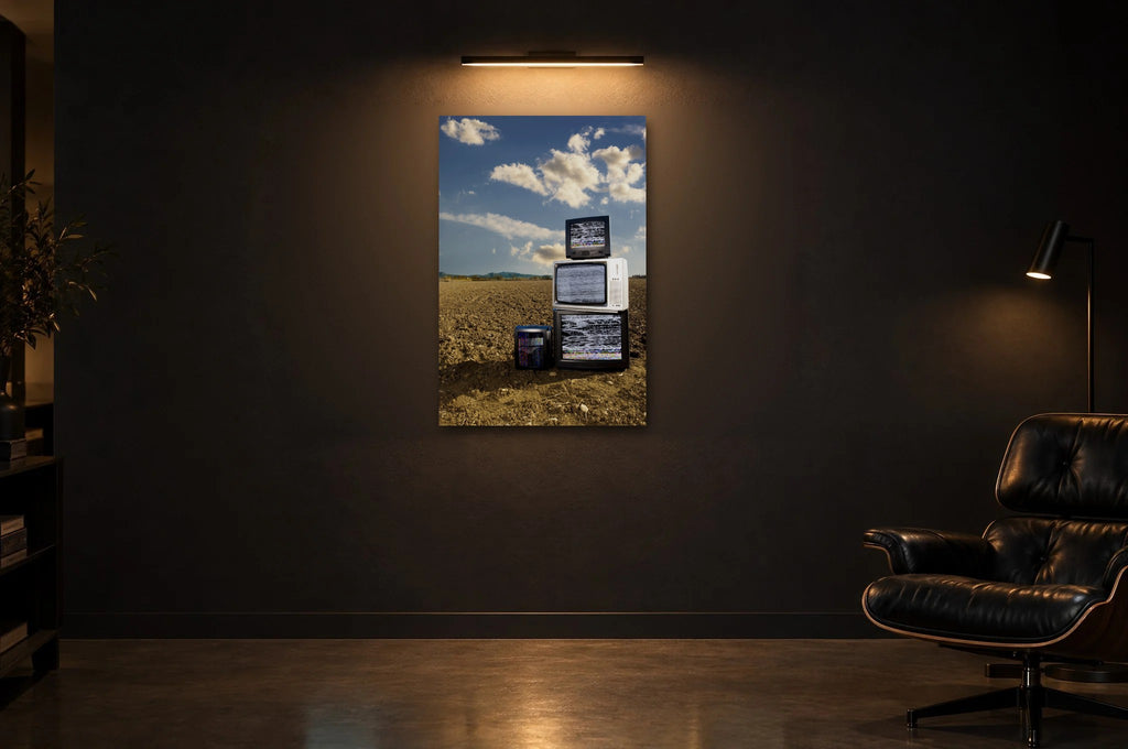 Television Project No. 10 — Cloud Cover — photo print shown in a dark gallery room under a picture light